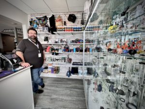 Kevin from Smoking Treasures Cockeysville, Maryland shows off the satellite shop at Kip Dispensary.